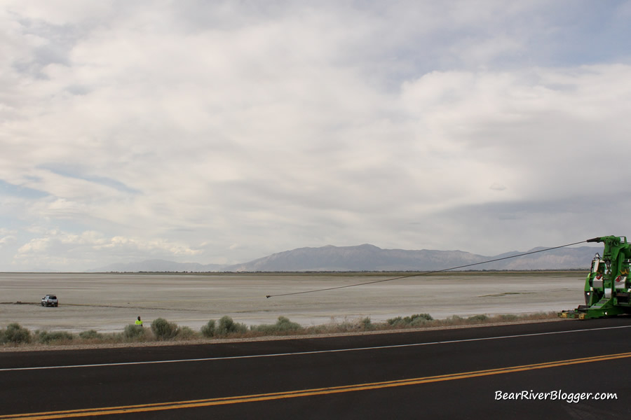 truck being pulled out of the mud on the great salt lake causeway mudflats