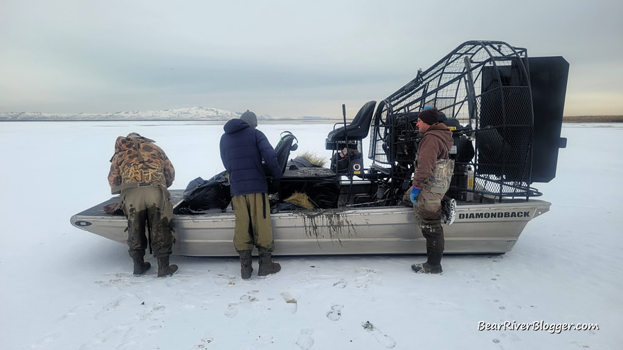 an airboat sitting on the ice at Farmington Bay WMA