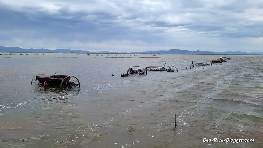 old farm equipment being flooded out from the nearby bear river
