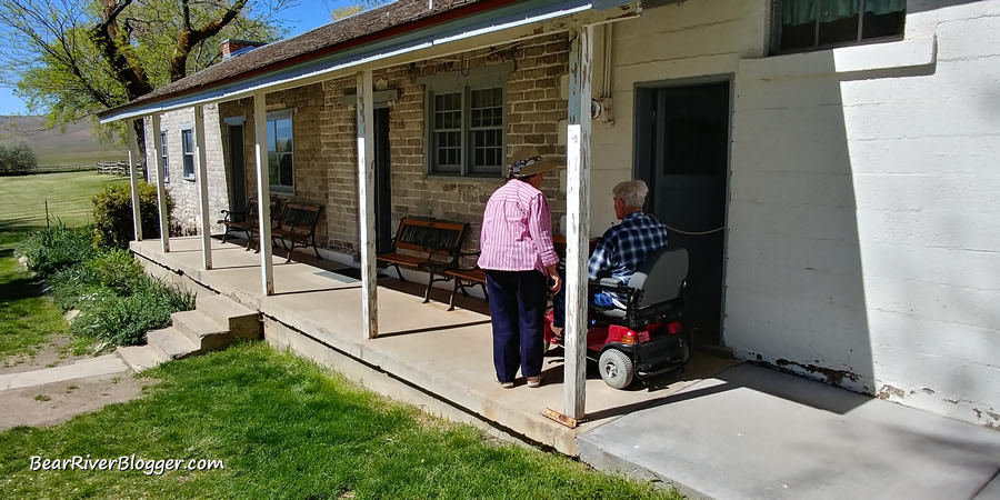 2 people checking out the buildings at Garr Ranch on Antelope Island