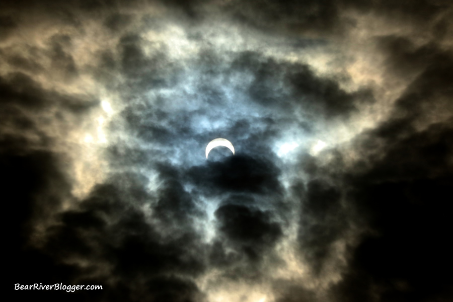 2023 partial solar eclipse in cloud cover from the bear river migratory bird refuge