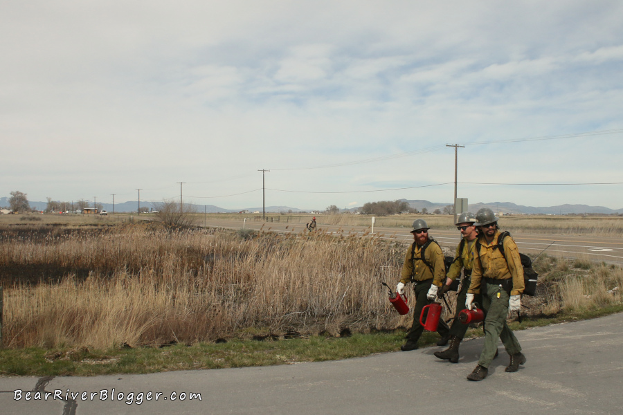 federal firefighters after igniting a prescribed fire on the bear river migratory bird refugeg