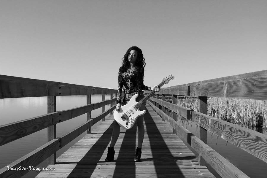 portrait photography session on a bridge