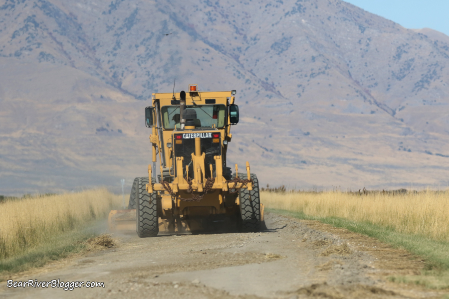 road grader on the bear river migratory bird refuge auto tour route
